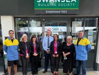 Swansea Building Society standing with Tata Steel employees.